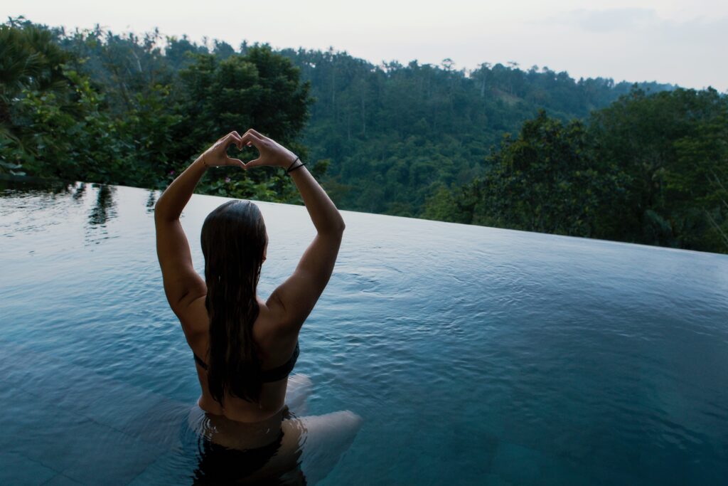 women doing Yoga in pool